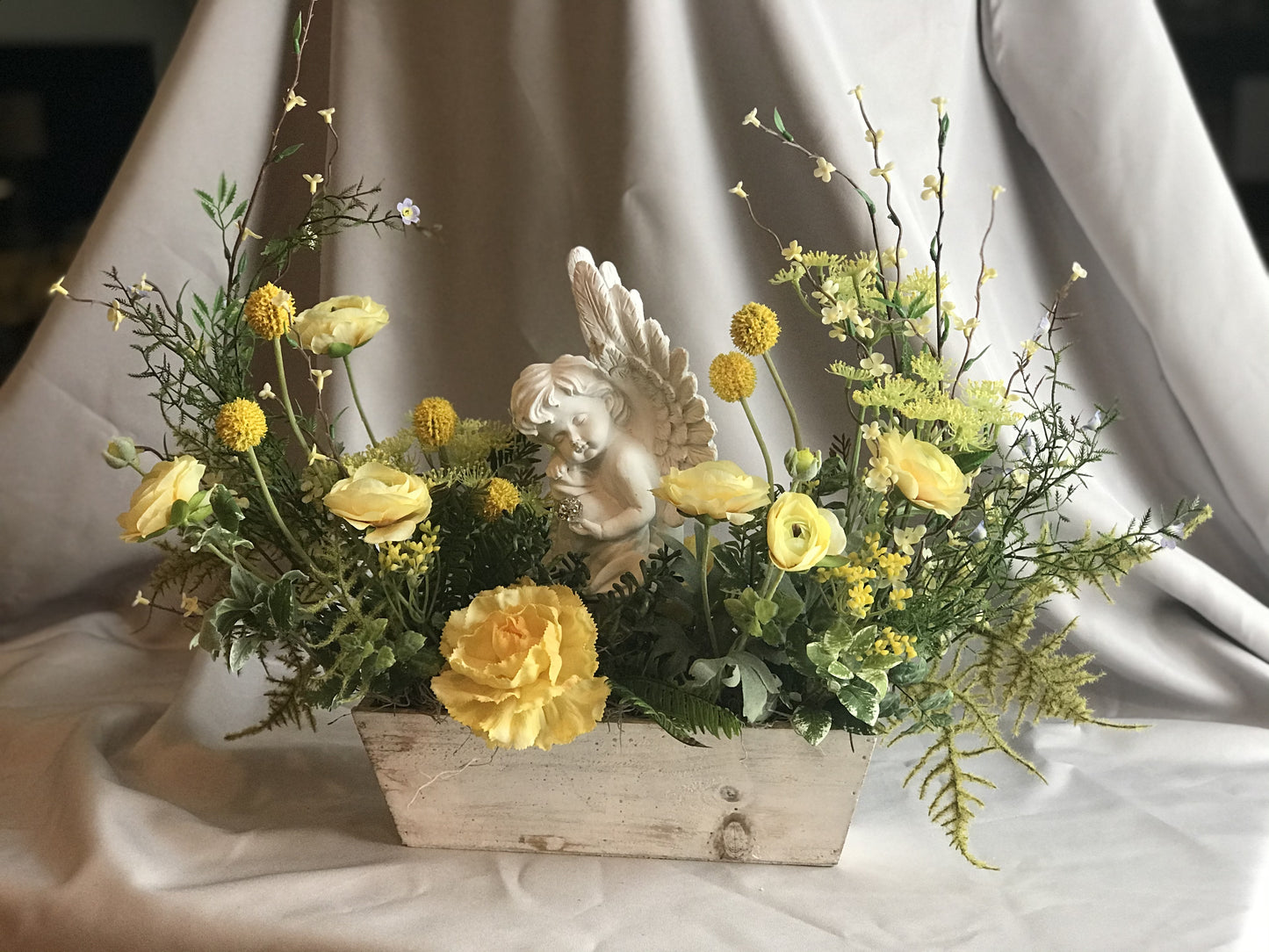 Sympathy angel design in Silk flowers