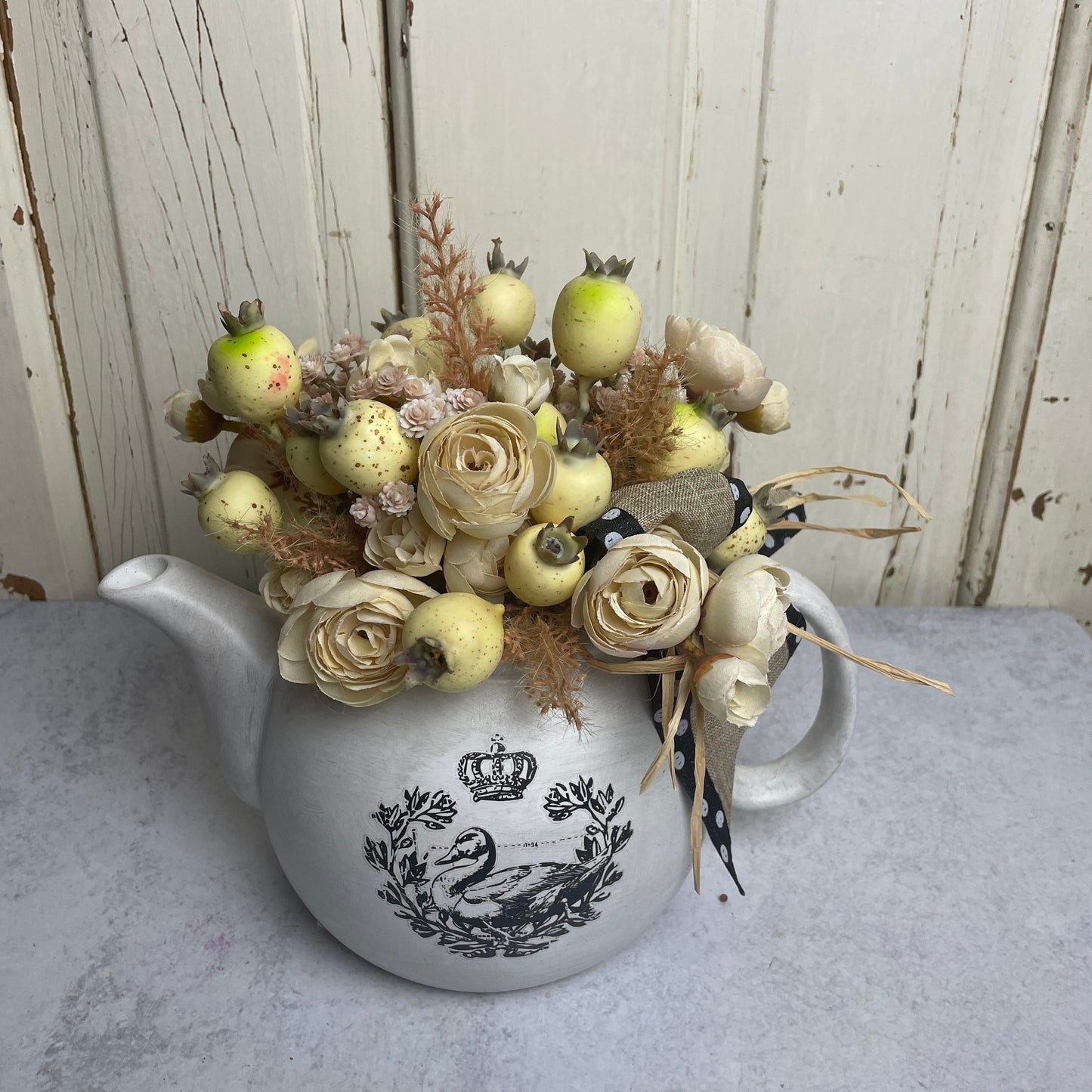 Teapot with florals and swan