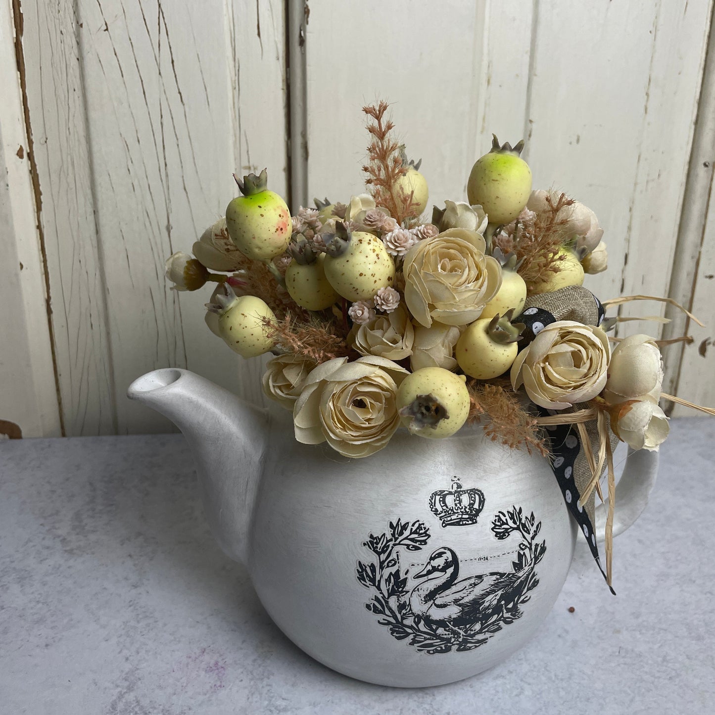 Teapot with florals and swan