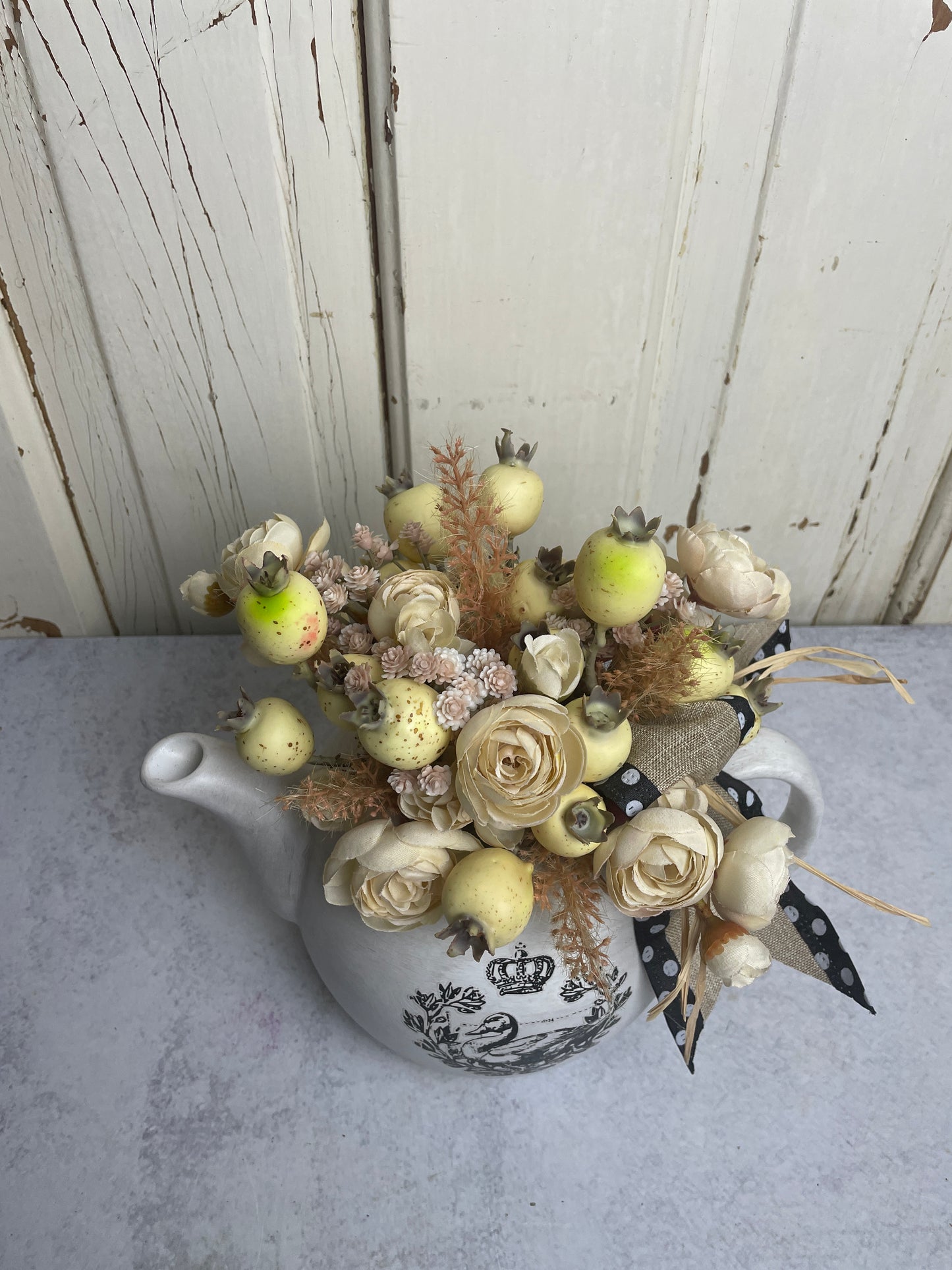 Teapot with florals and swan