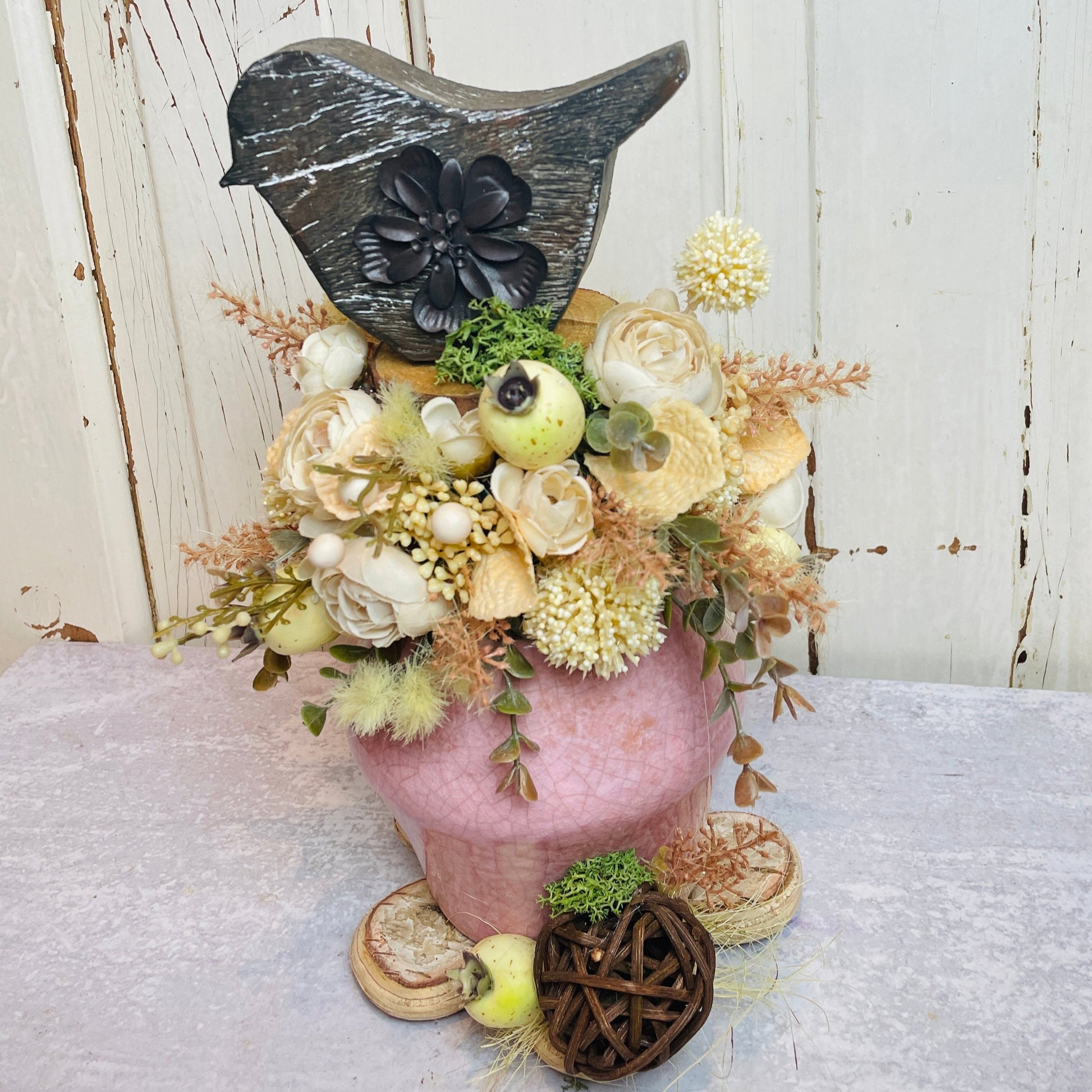 Cottage style floral centerpiece with neutral roses and vintage wooden bird, rustic cottage decor, soft neutral floral arrangement, home centerpiece for cozy cottage living