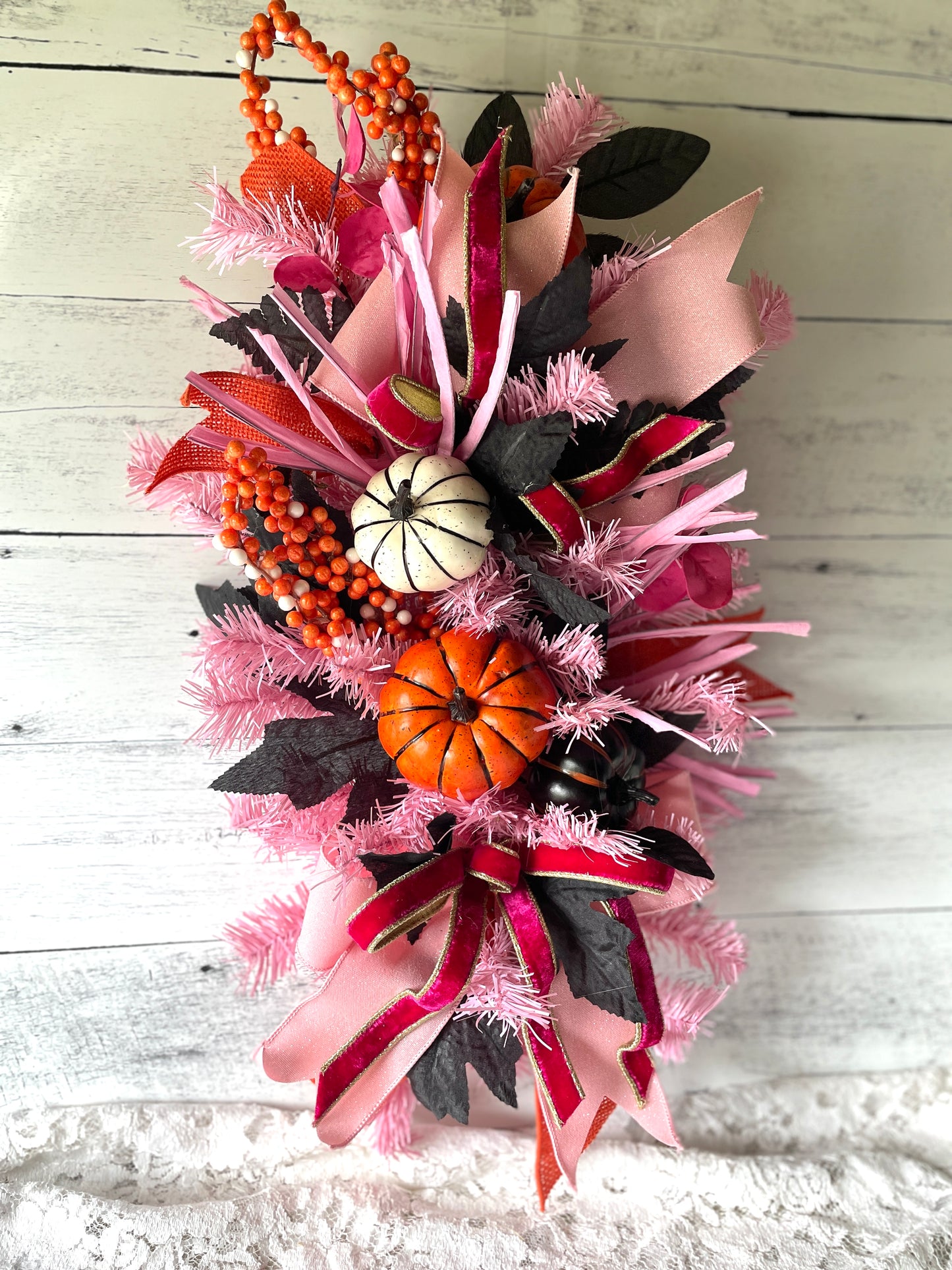 Whimsical pink and black halloween floral swag