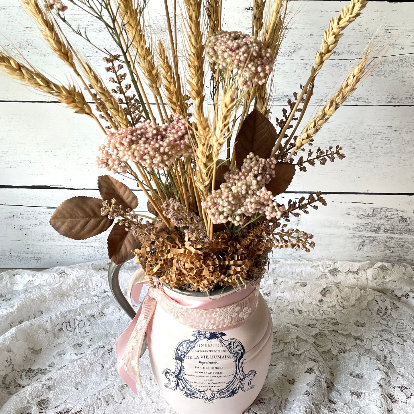 Dried floral arrangement in vintage pitcher