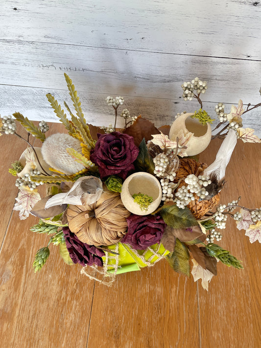 Pumpkin and roses fall centerpiece