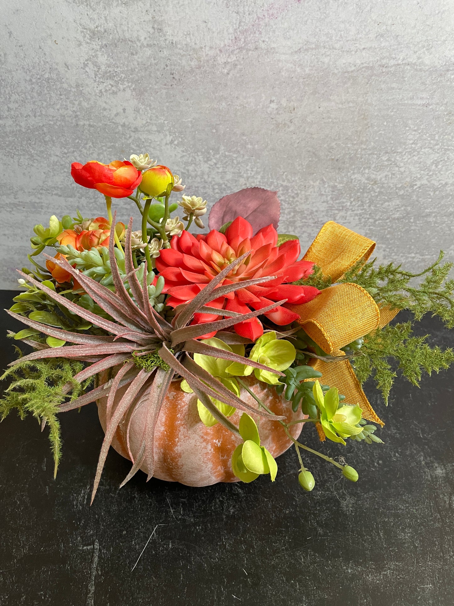 Pumpkin decor with succulents