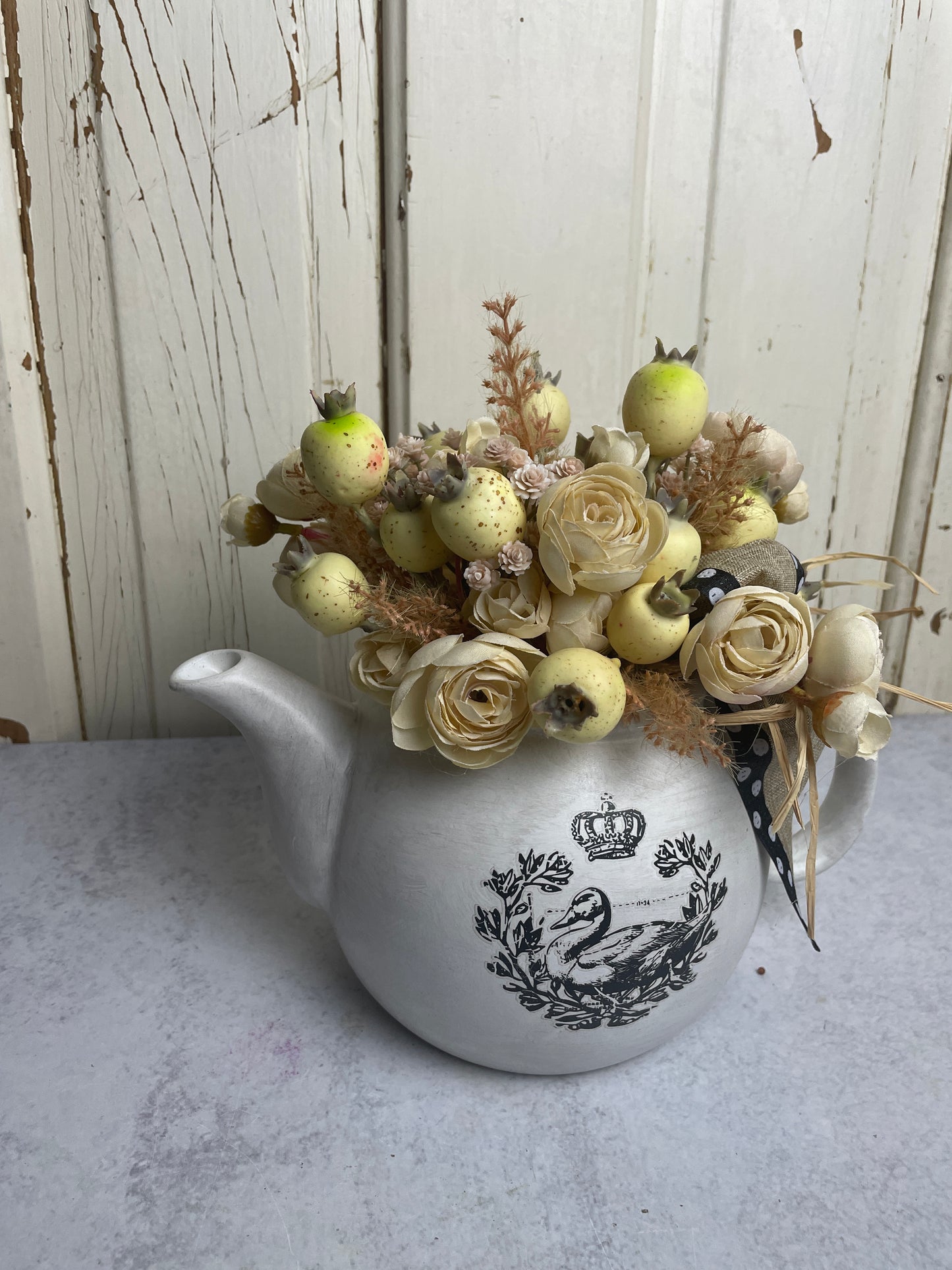 Teapot with florals and swan