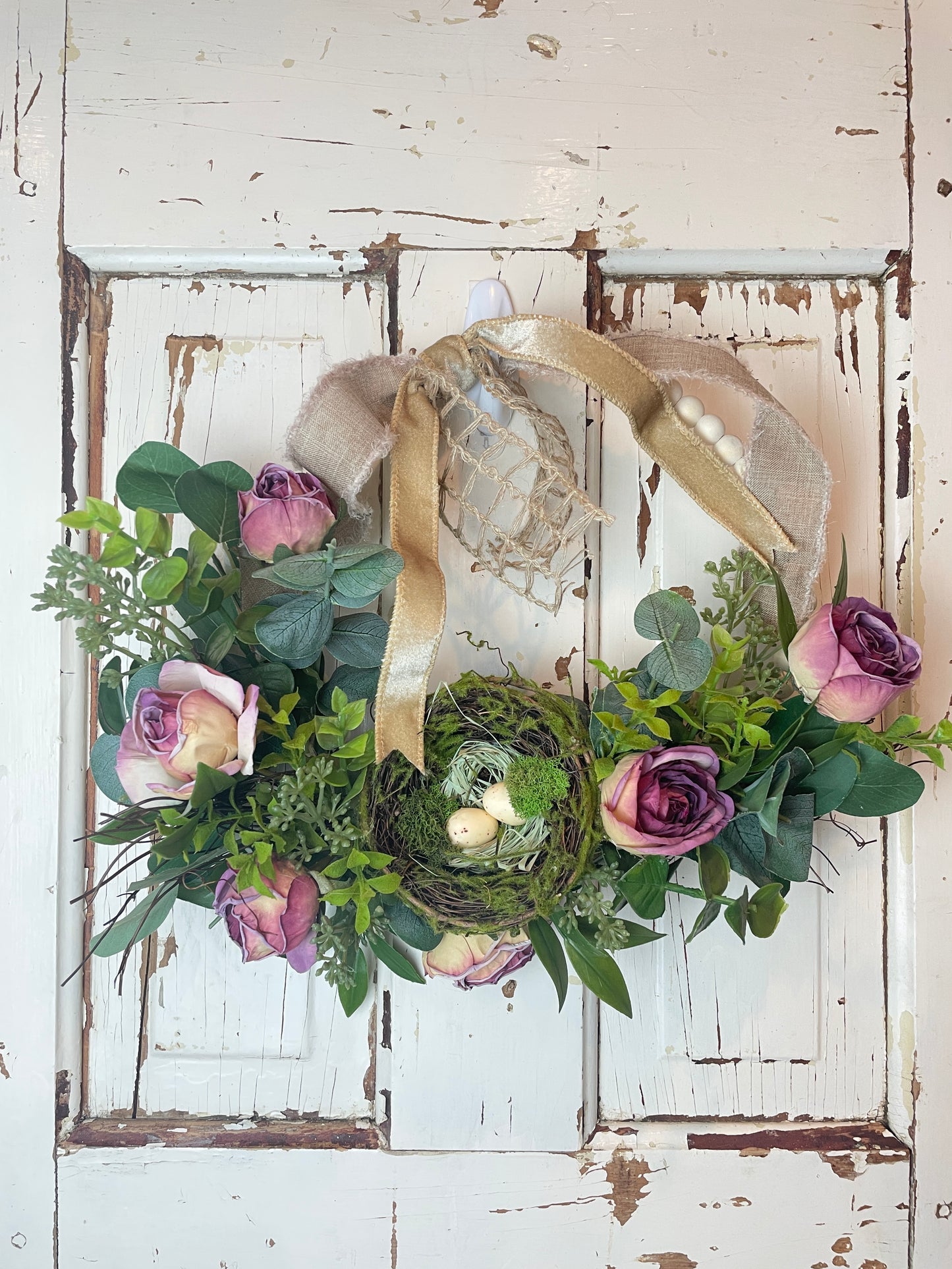 Pink roses grapevine wreath with birds nest