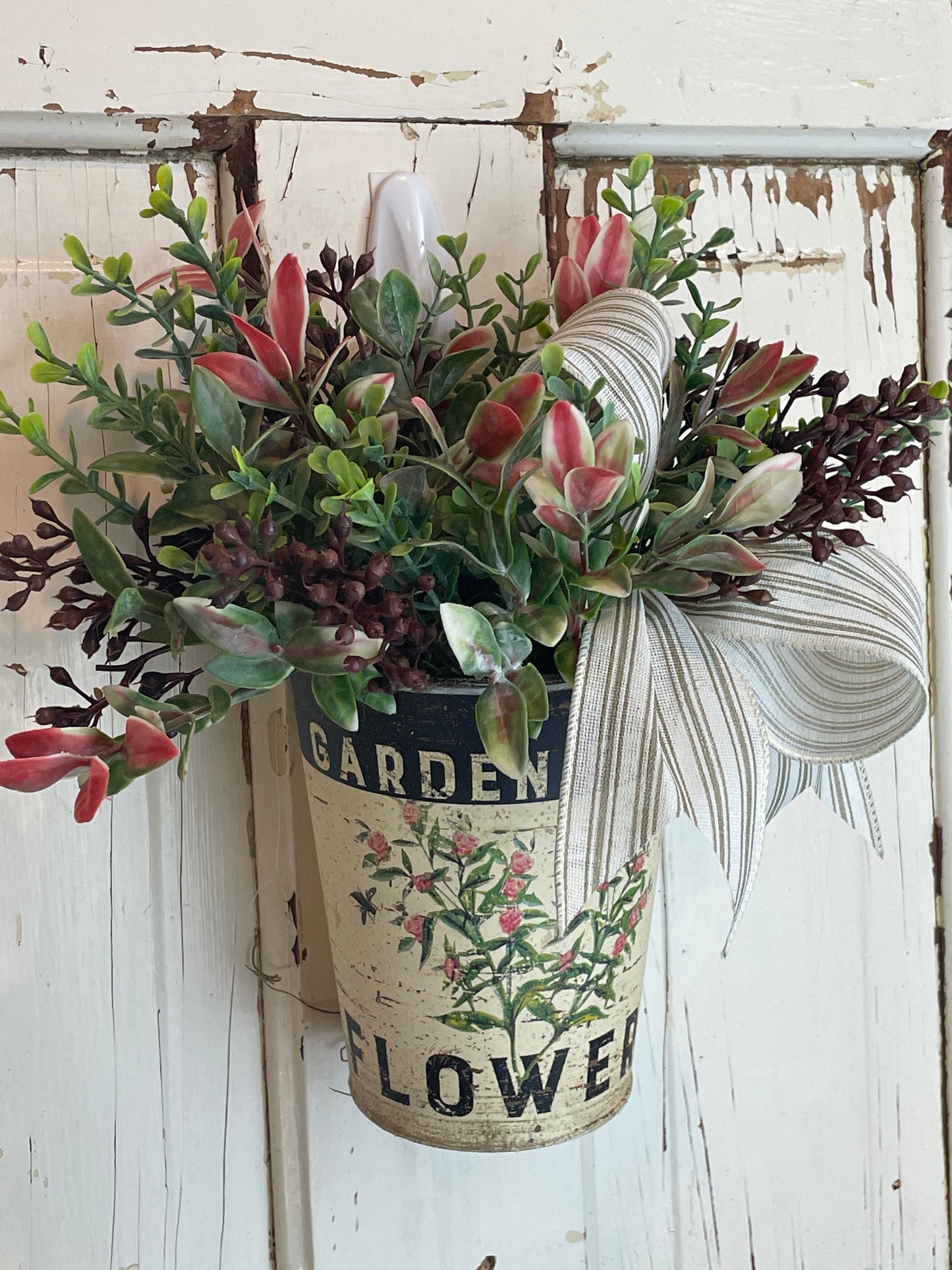 Hanging farmhouse style wall bucket with faux herbs and flowers graphic 