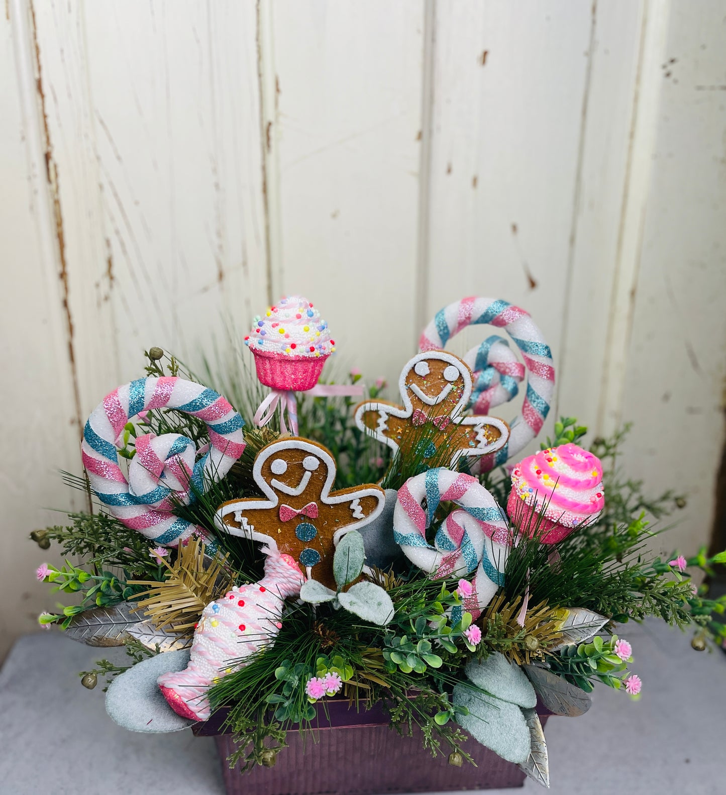 Gingerbread land cupcakes floral arrangement