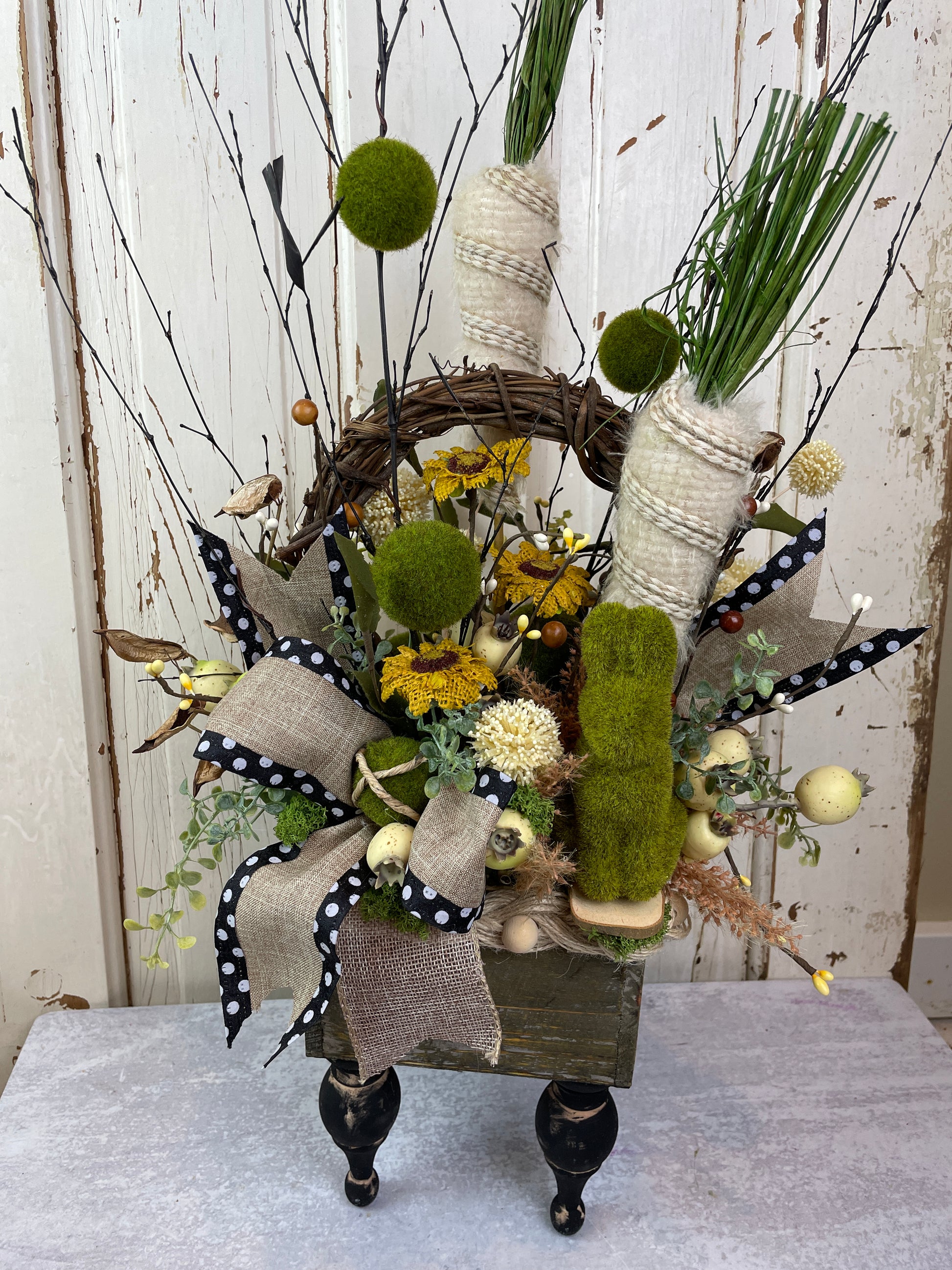 farmhouse table decor with burlap carrots and moss bunny for centerpiece 