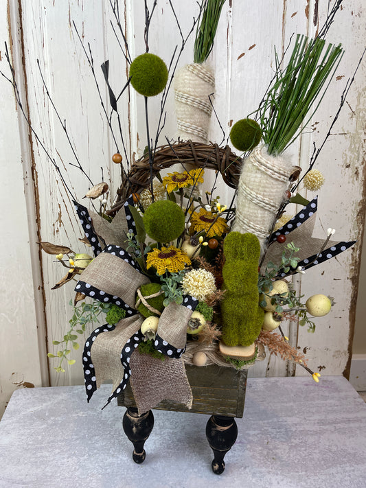 farmhouse table decor with burlap carrots and moss bunny for centerpiece 