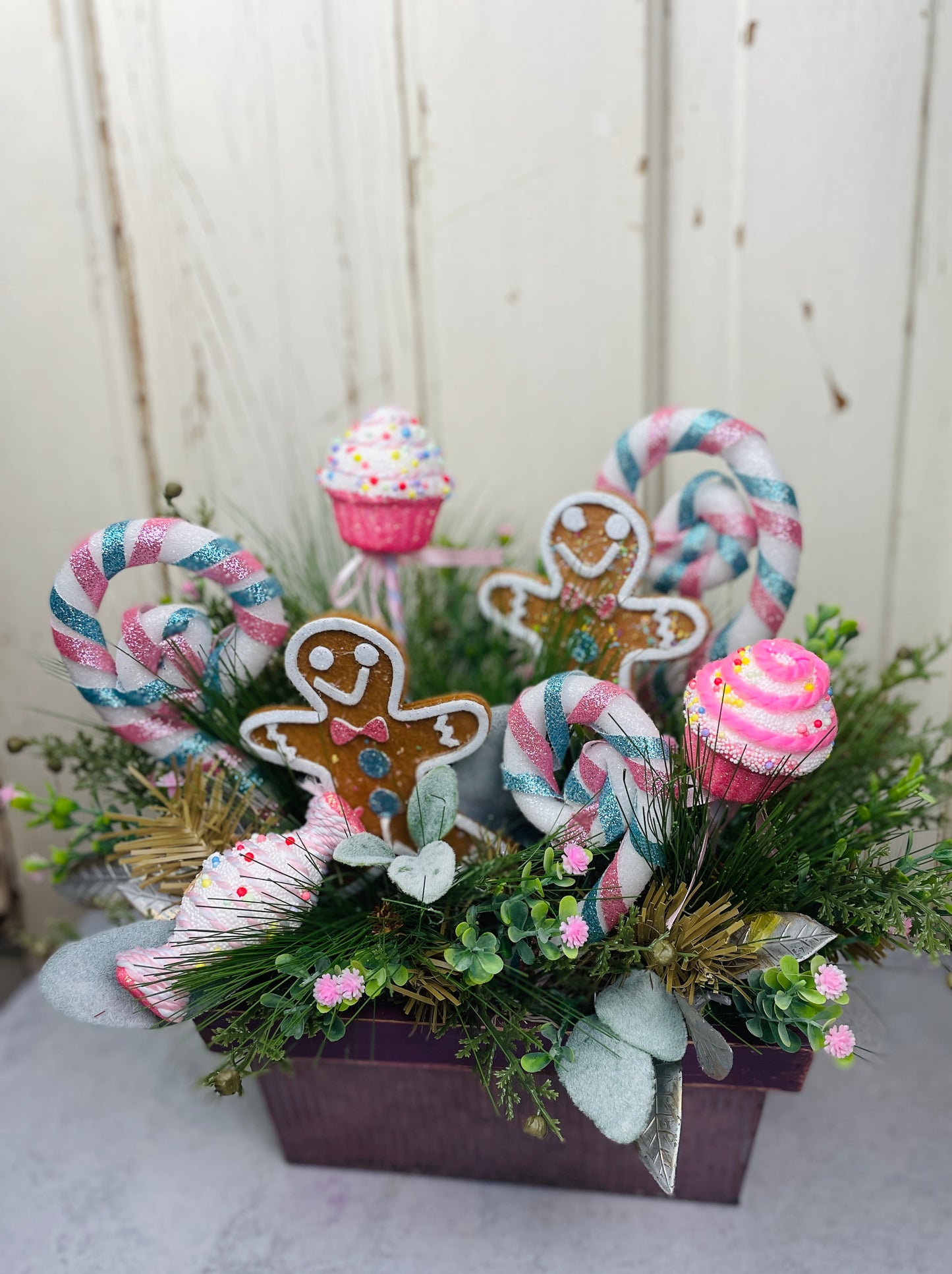 Gingerbread land cupcakes floral arrangement