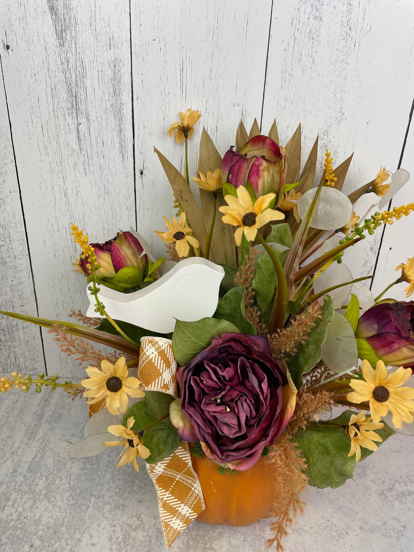 Fall Floral Arrangement in Pumpkin Container with Palm Leaves