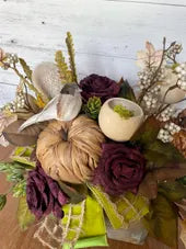 Pumpkin and roses fall centerpiece